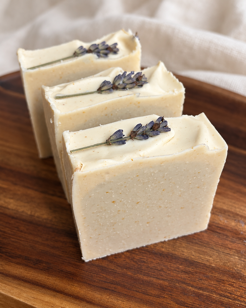 Close-up of Lavender Meadow soap with its handmade texture and dried lavender