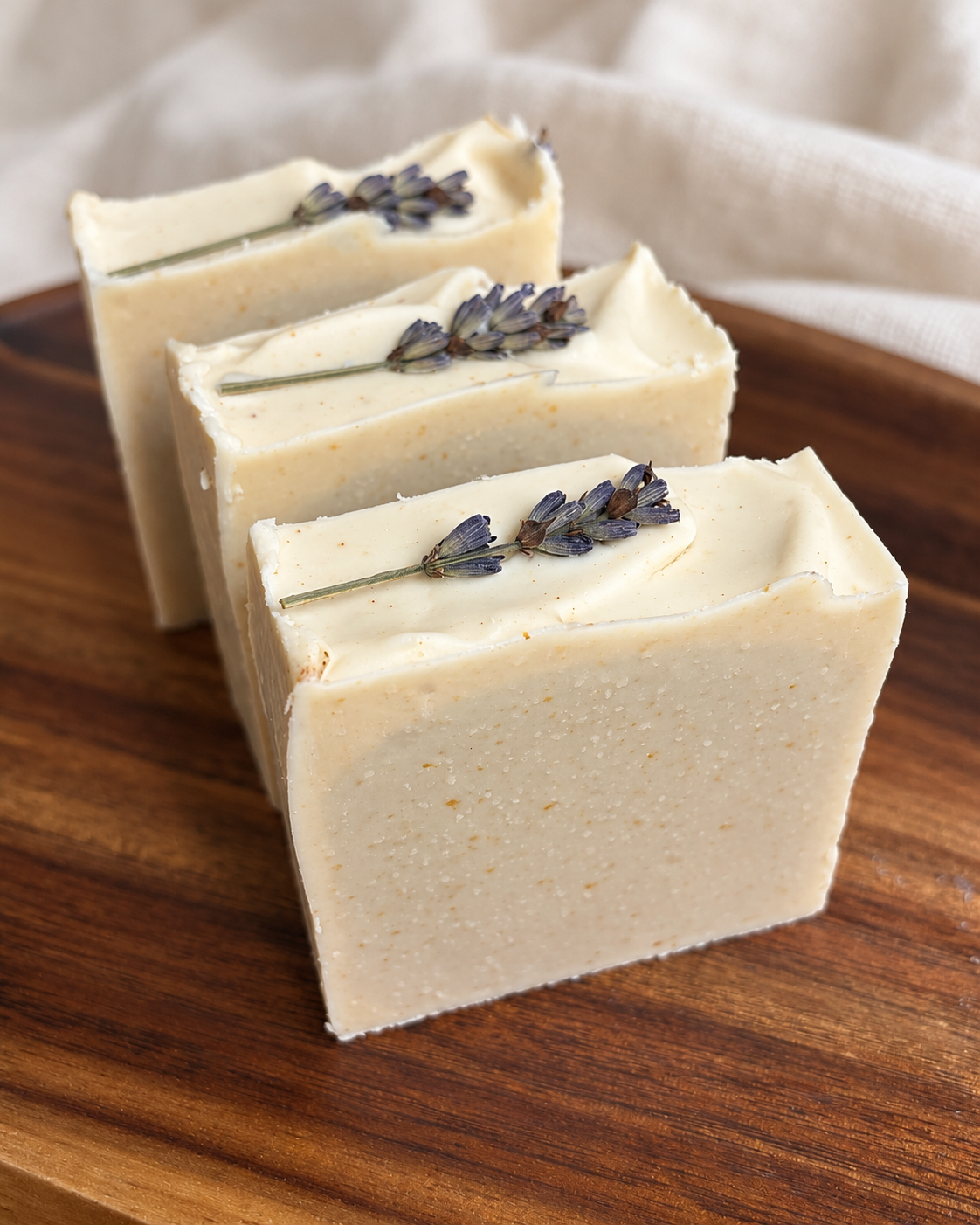 Close-up of Lavender Meadow soap with its handmade texture and dried lavender