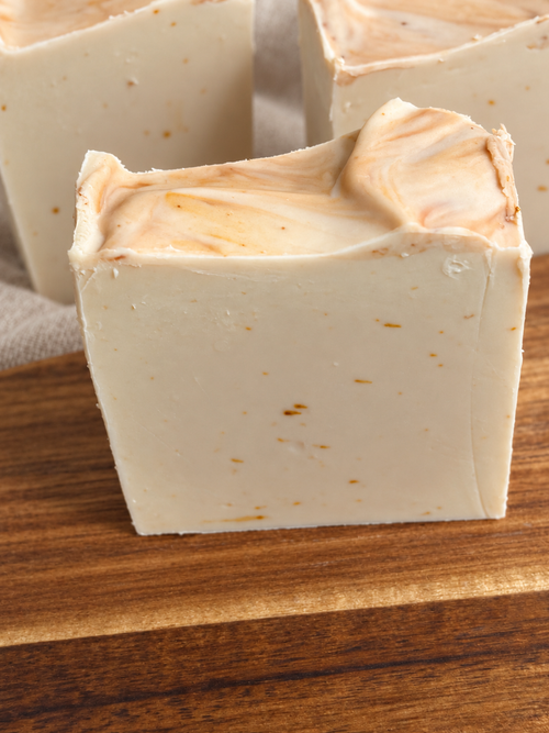Reading Room honey and beeswax soap close-up with creamy texture and softly swirled top
